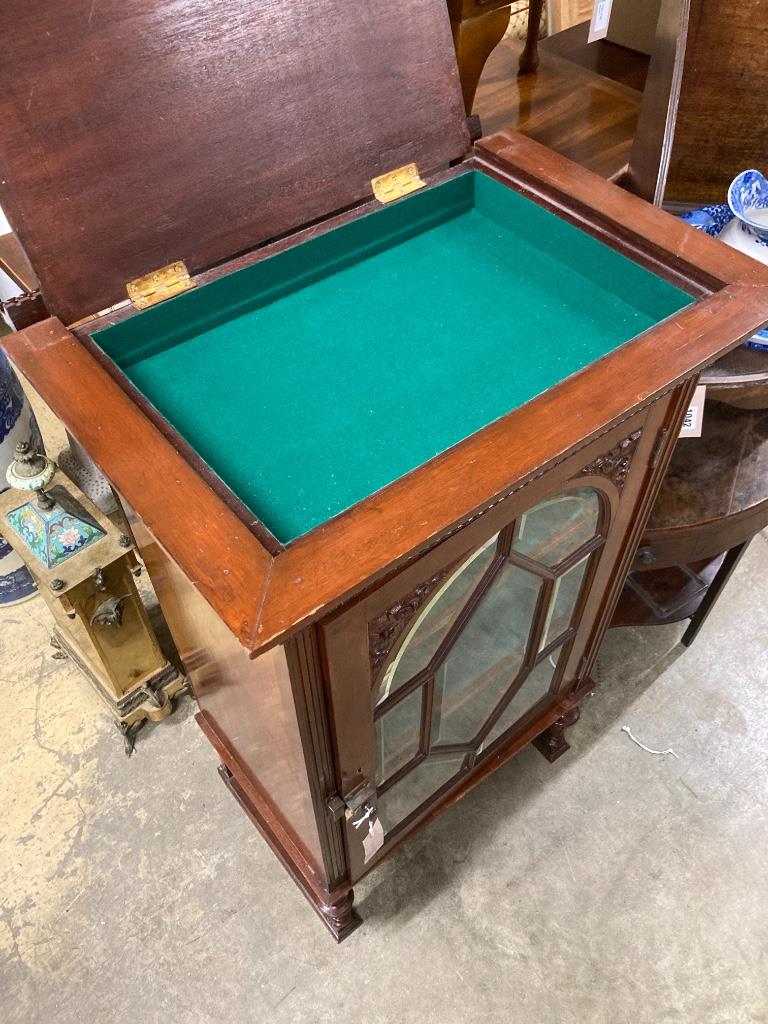 A mahogany cabinet stamped 'Admiral's day cabin 425', width 63cm, depth 42cm, height 115cm